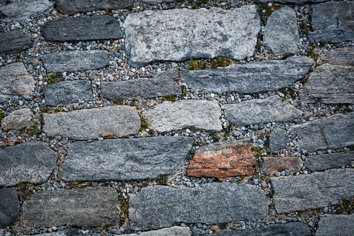Natural stone pavers arranged in a pattern, ideal for enhancing outdoor living spaces.